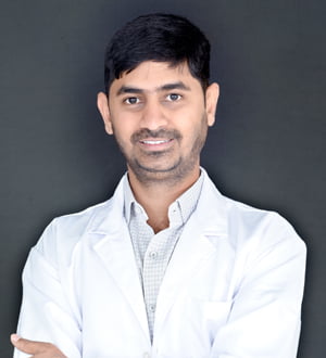 Dr Abhishek S